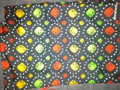 Stylish Printed Fabric – Black Base with Colorful Design