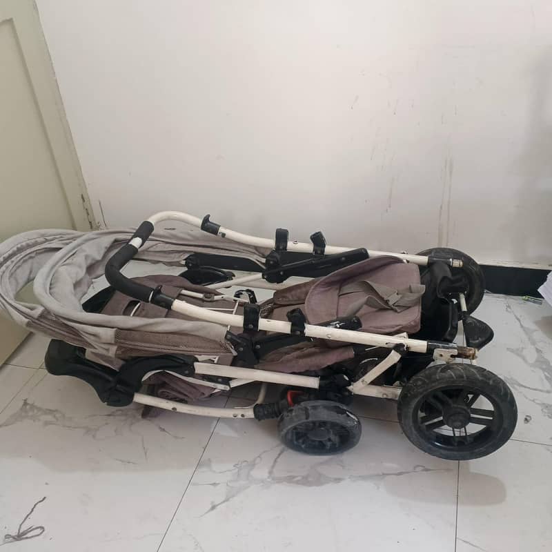 Twin branded  pram for sale 8