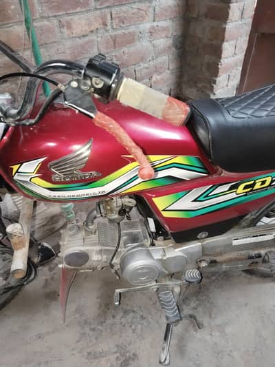 CD 70 2023 model red color