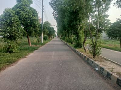 18 Marla Plot On Main 60 feet Road College Town Back Side IEP Town Society Lahore
