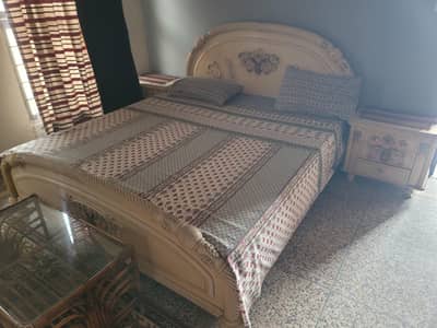 bed set and sofa with tables