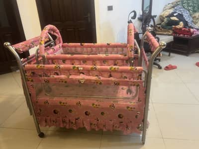 Selling a 2in1 baby cot and detachable swing cradle in clean condition