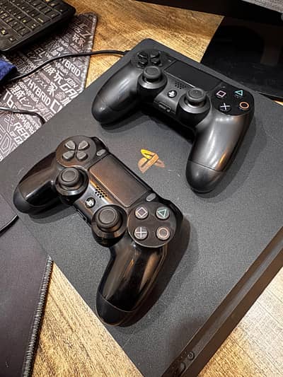 PS4 slim 512GB with 2 original DualShock controllers.