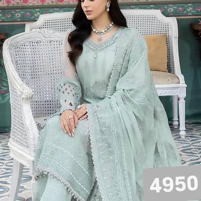 ORGANZA EMBROIDERED SEQUENCE FRONT EMBELISH WITH HANDWORK .