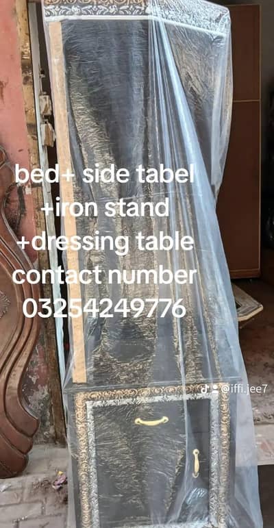 Double bed with side Tables, Iron stand and Dressing Table.