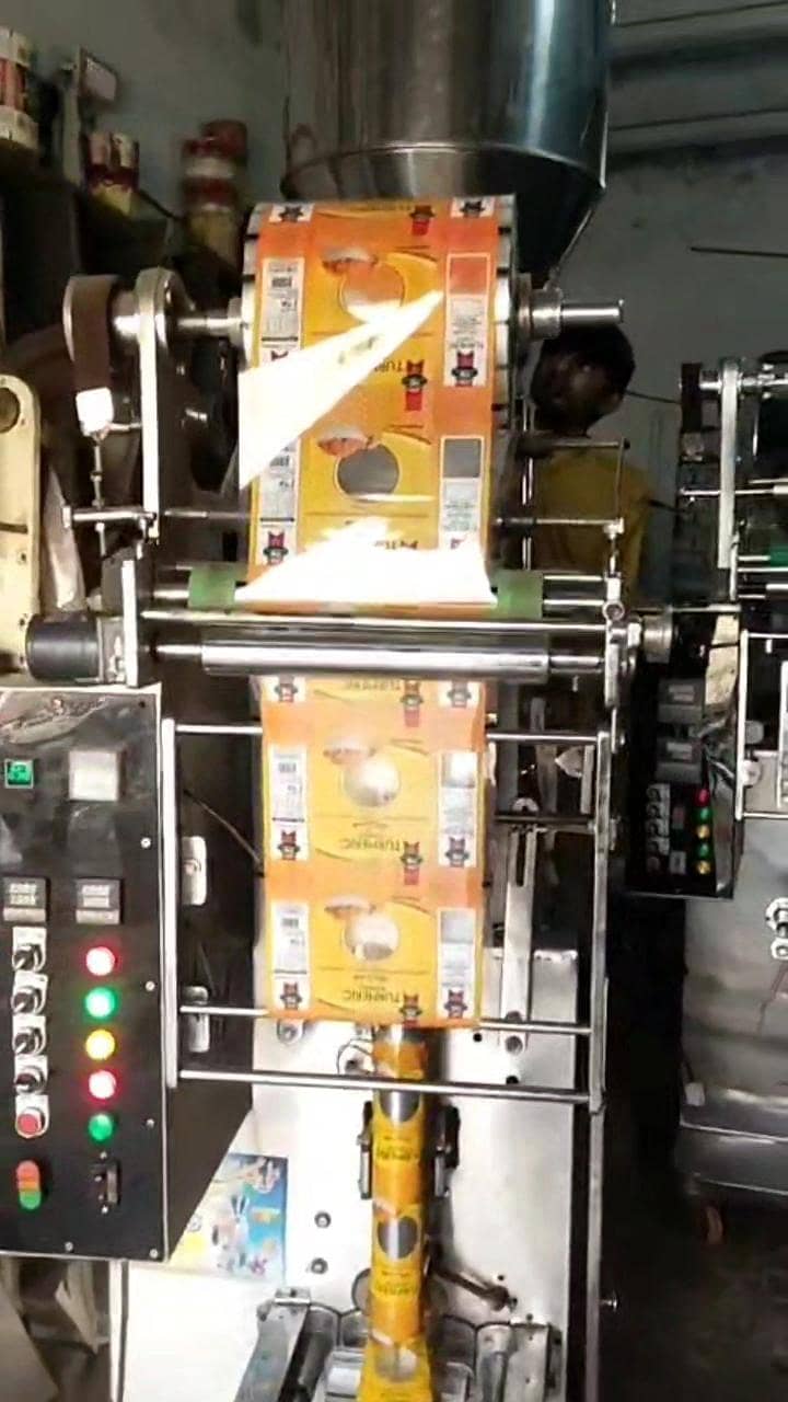 packing machine with red chilli and haldi wrapper 1