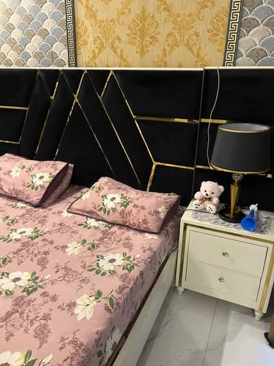 Bed with side tables