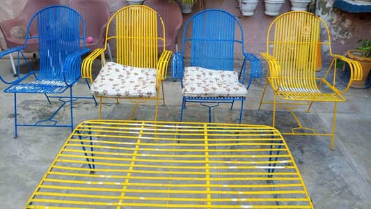 4 iron garden chairs with iron table for sale
