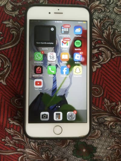 Apple iPhone 6S Plus cuz brought it from london with him