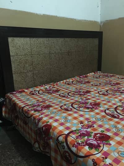 Wooden Double Bed with Stylish Headboard – Great Condition