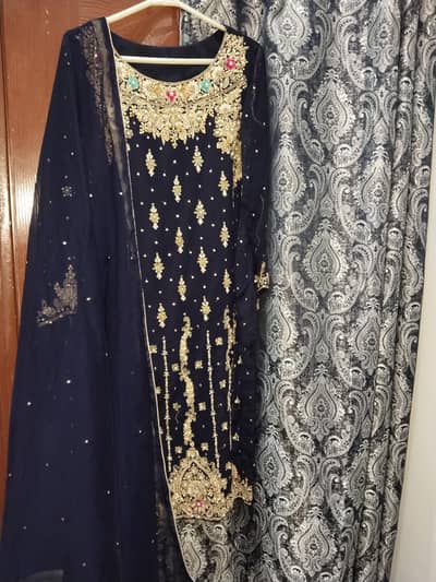 “One-Time Worn Navy Blue & Gold Embroidered Wedding Dress.