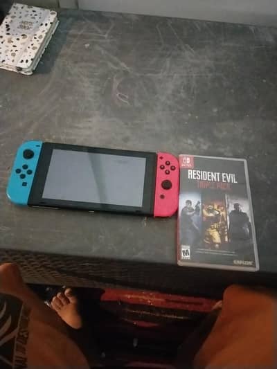 Nintendo switch with resident evil triple pack URGENT SALE