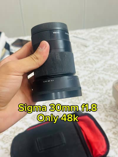 Canon 100m macro lense with mount and sigma 30mm f1.8