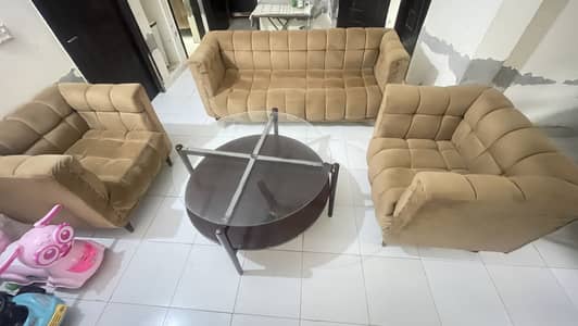 5 Seater sofa with round table