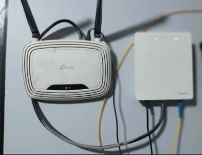 TP LINK WIFI ROUTER DOUBLE ANTINA AND HUAWEI Storm Fibre Device