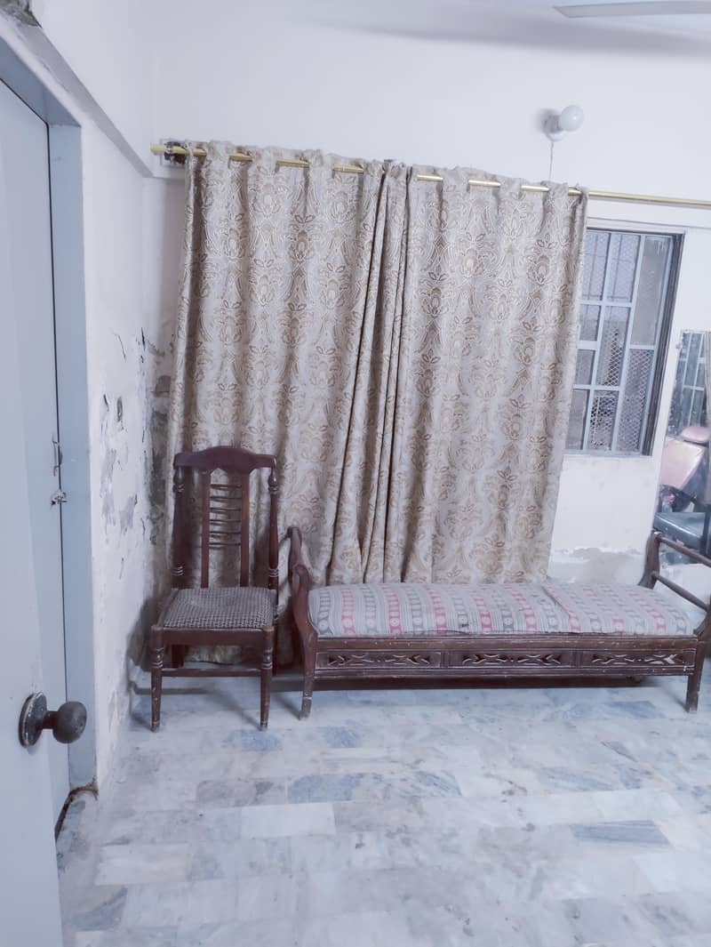 ground floor portion 2bed dd block 4 johar near Kamran chowrangi 0
