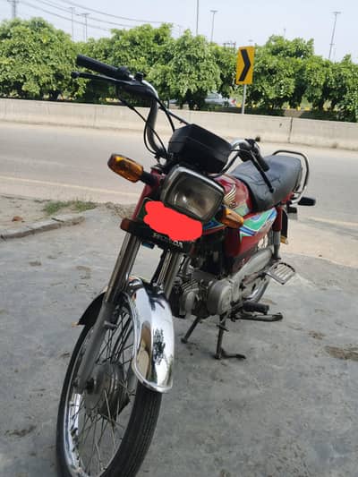 Honda CD 70 – Red Color | Well Maintained | Genuine Documents