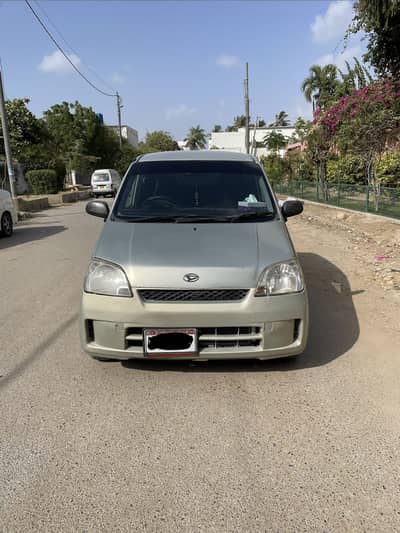 Daihatsu Mira 2004
