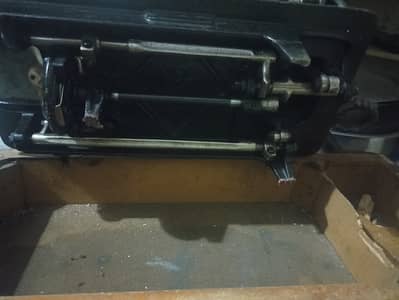 Singer slai machine slightly used and in good condition