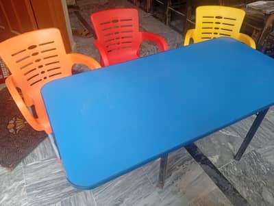 colorful nursery chair with 4/2 tables