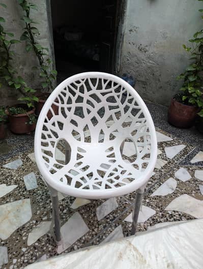 White Plastic Tree Chair urgent sale ke liye available hai.