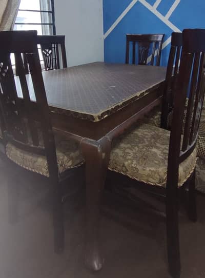 Used medium size Dinning Table with 6 chairs