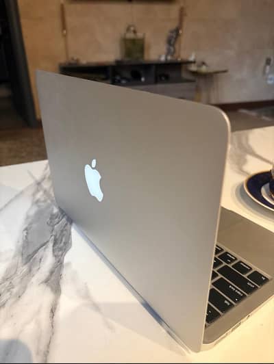Mint condition macbook air 2015 exchange possible with iphones