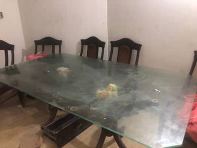Glass dinning table with 5 chairs
