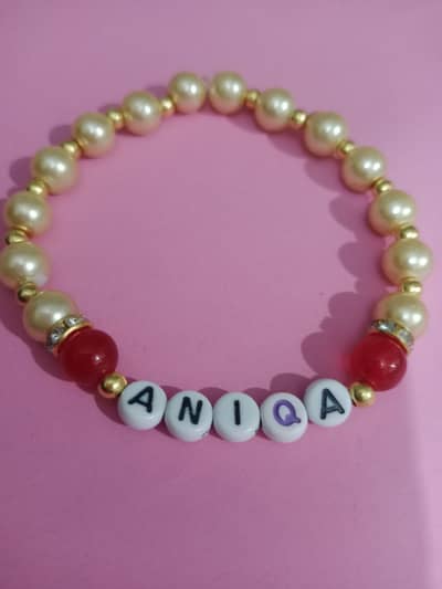hand made breclets with customized name and charms