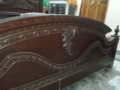 used king size wooden bed for sale. in good condition without mattress