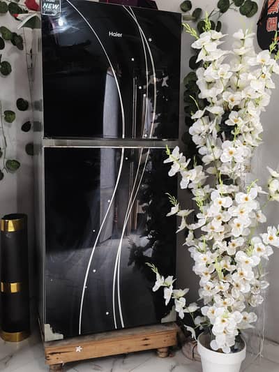 Haier glass door fridge available in good condition