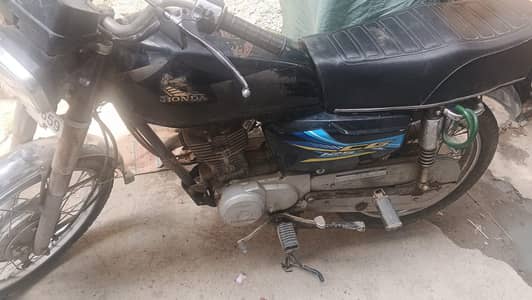 Honda 125 2010 model book file genuine or biometric
