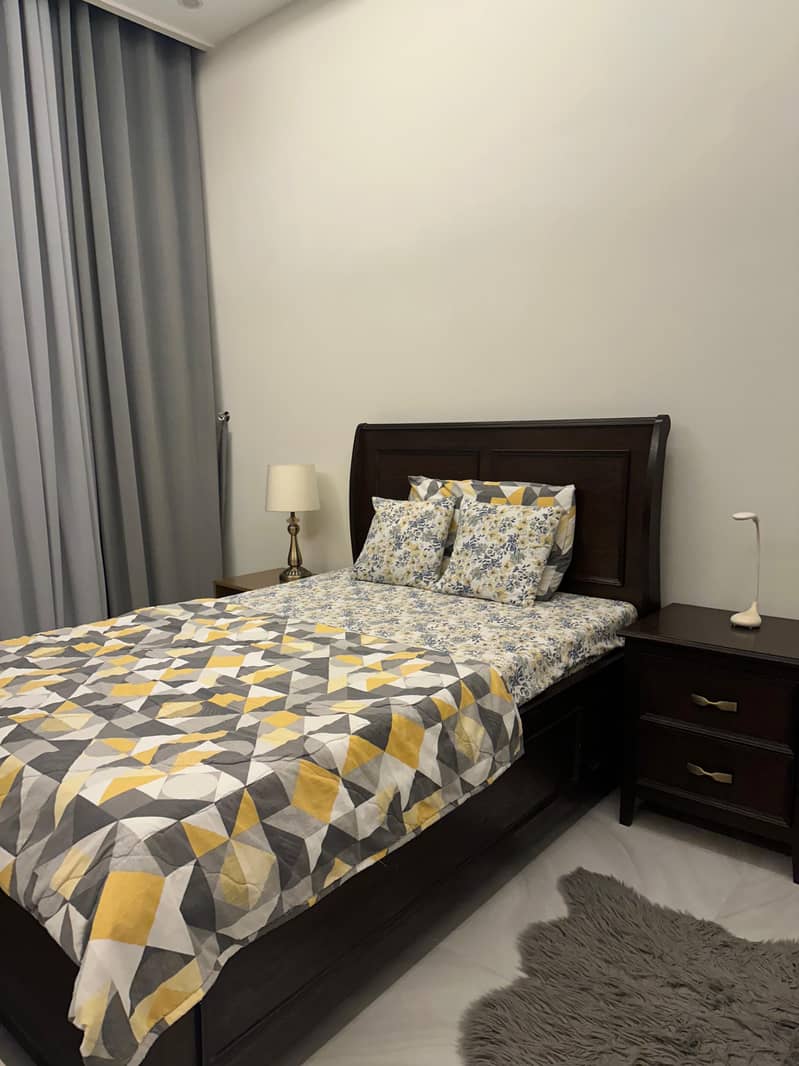 Single bed  with one side table and dressing table 1