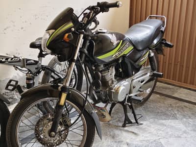 honda delux 125 2016 total orignal