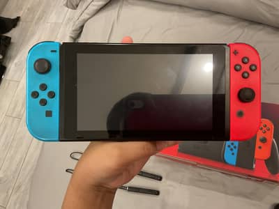 Nintendo switch v2 barely used with box,carrying case,and dock