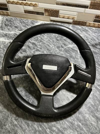 I am selling car steering wheel