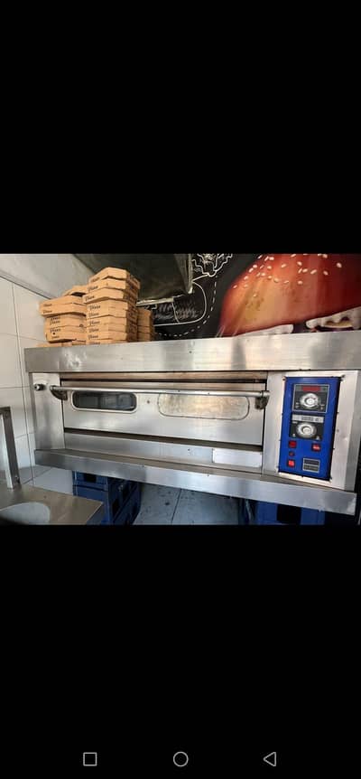 pizza making machine and fryers with counter table