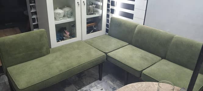 L shaped sofa with center table