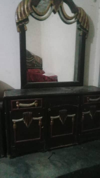 bed with dressing and showcase
