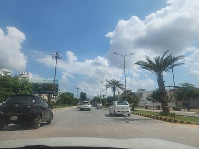 CORNER PLOT AVAILABLE FOR SALE AT PRIME LOCATION OF OVERSEAS BLOCK