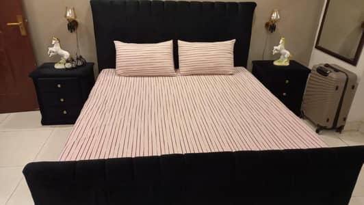 bed. 2side tables  in black