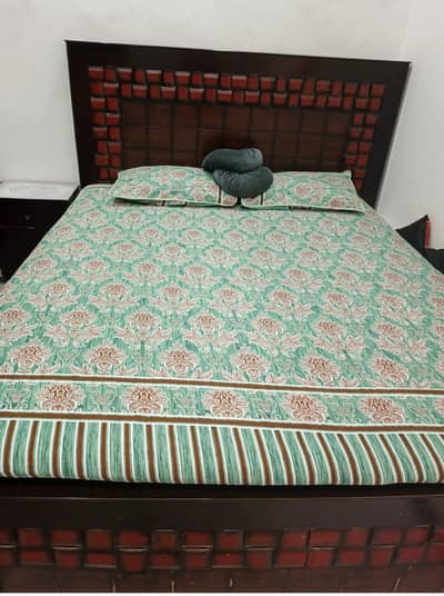 double bed with 2 side tables
