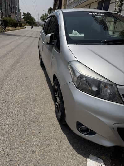 vitz car 2013 model/ 2017  registration minor touching no pain
