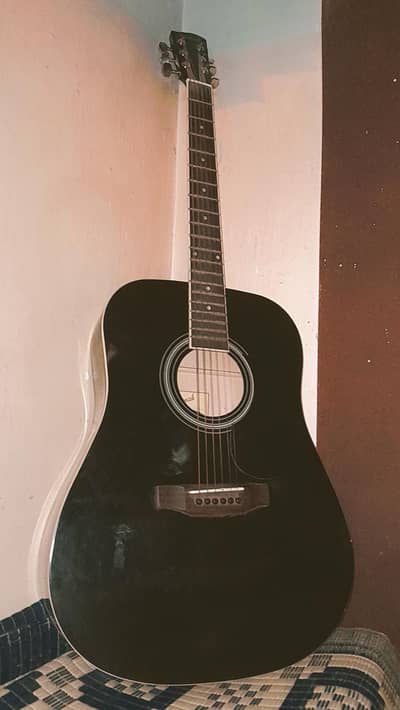 jumbo acoustic guitar with box