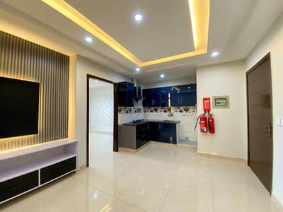ONE BED SEMI FURNISHED APARTMENT FOR SALE AT INVESTOR RATE IN BAHRIA TOWN LAHORE