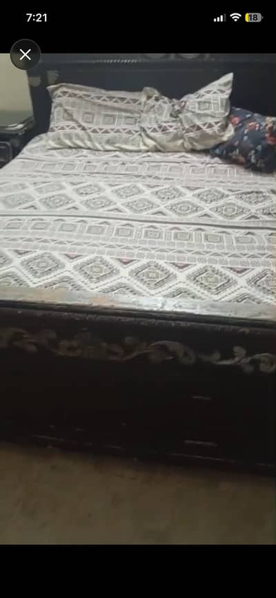 Antique carved wooden bed