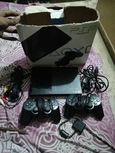 Ps2 slim in great condition with orignlasla controller
