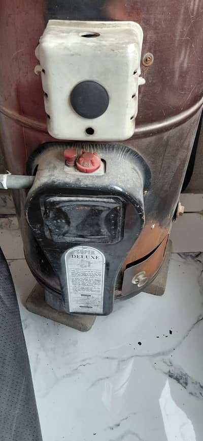 Urgent sale super deluxe gas n electric geyser