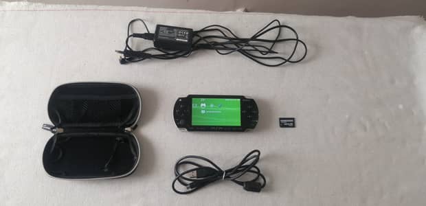 PSP 1000 Jailbroken ARK 4 with all accessories.