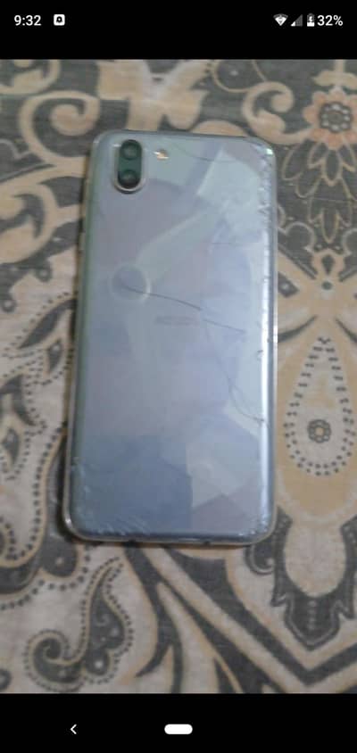 Mobile complete name Aquos R2 . .
